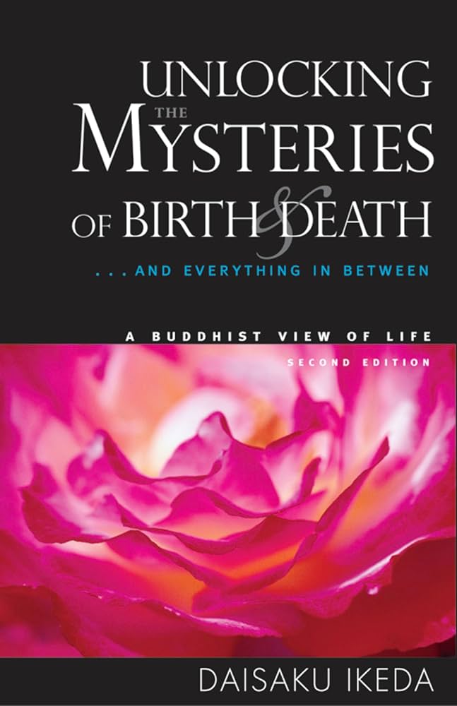 Cover of the book "Unlocking the Mysteries of Birth and Death: Buddhism in the Contemporary World" by Daisaku Ikeda, featuring a vibrant pink flower on a black background.
